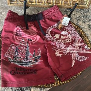 Disney Pirates of the Caribbean swim trunks sz xsmall burgundy New with tag